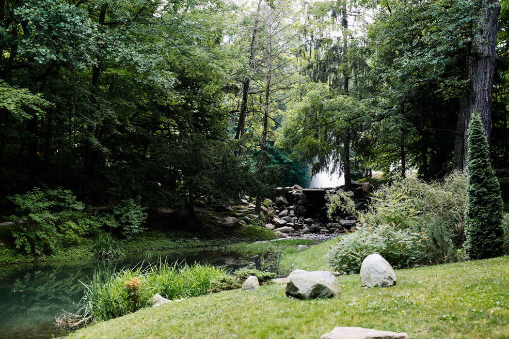 small waterfall and pond on way to Holcomb Gardens