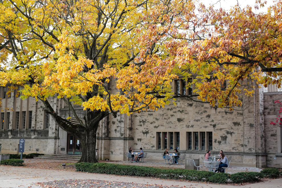 Butler University academic building with fall leaves