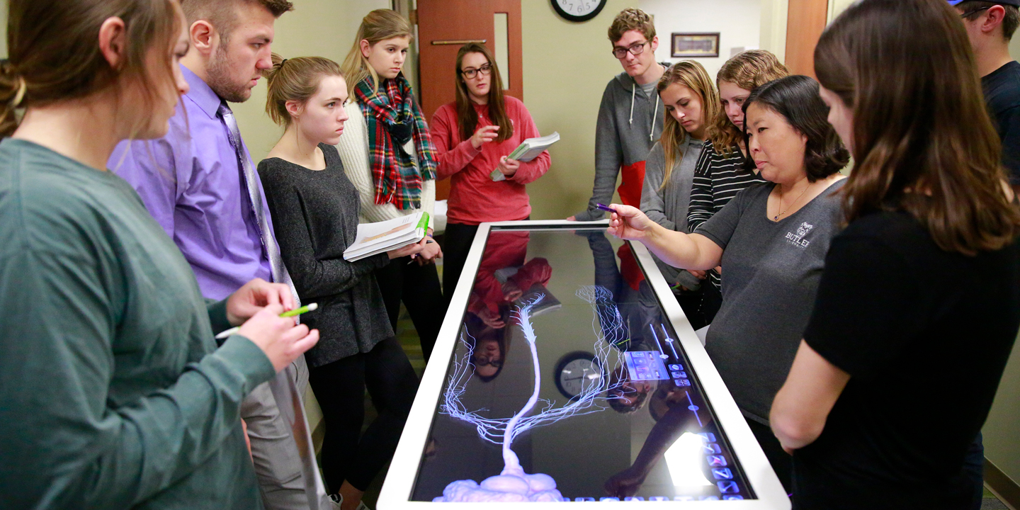 students learning anatomy with interactive technology