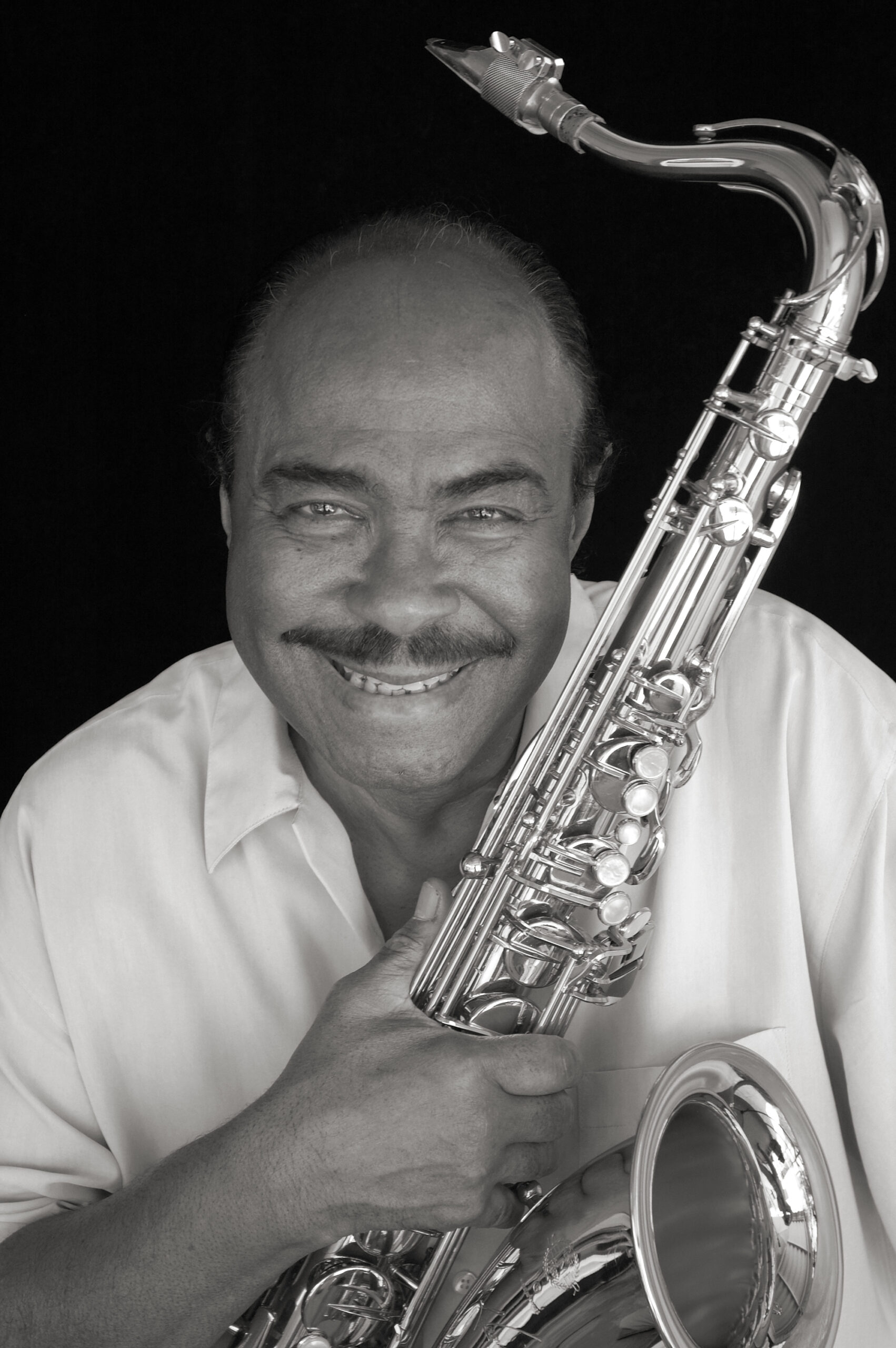 Benny Golson with saxophone