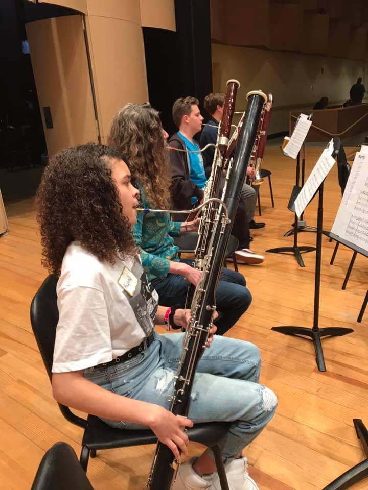 participants in Double Reed Day playing bassoon on the Schrott Center for the Arts stage
