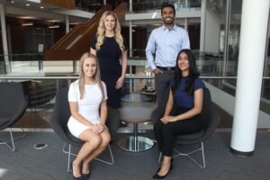 Four Pharmacy Fellows in a professional group photo