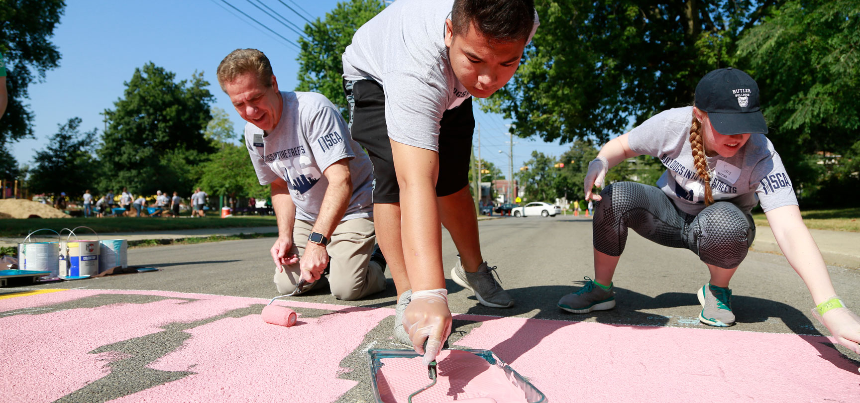 Students and President Danko painting