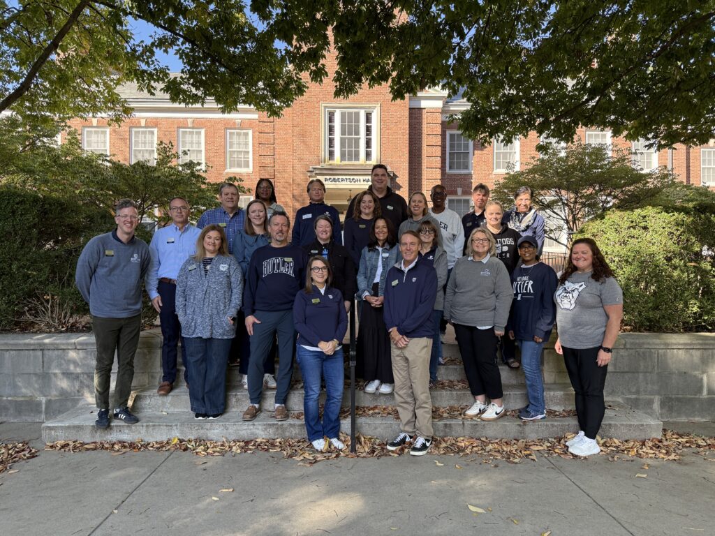Members of the family council (fall 2025) gathered on the steps outside of Robertson Hall.