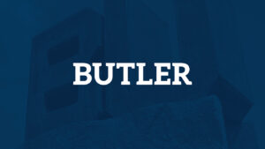 blue on blue BU, word Butler in white