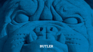 blue on blue image of bulldog head, word Butler